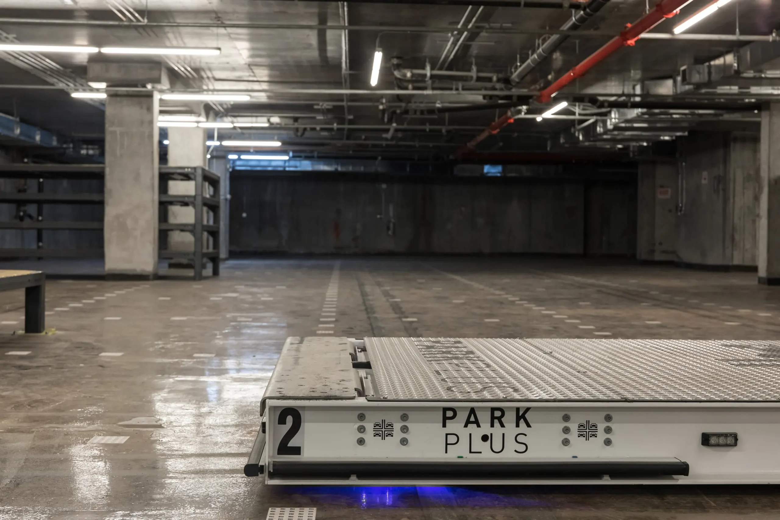 AGV robotic vehicle navigating inside a parking vault