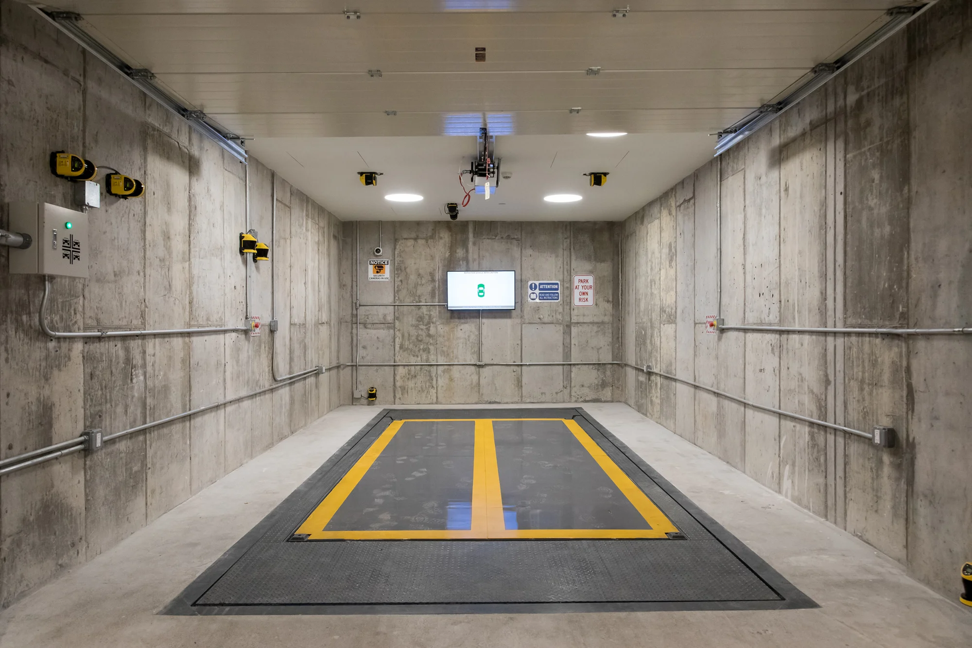 ParkPlus AGV automated robotic parking system loading zone in a residential garage