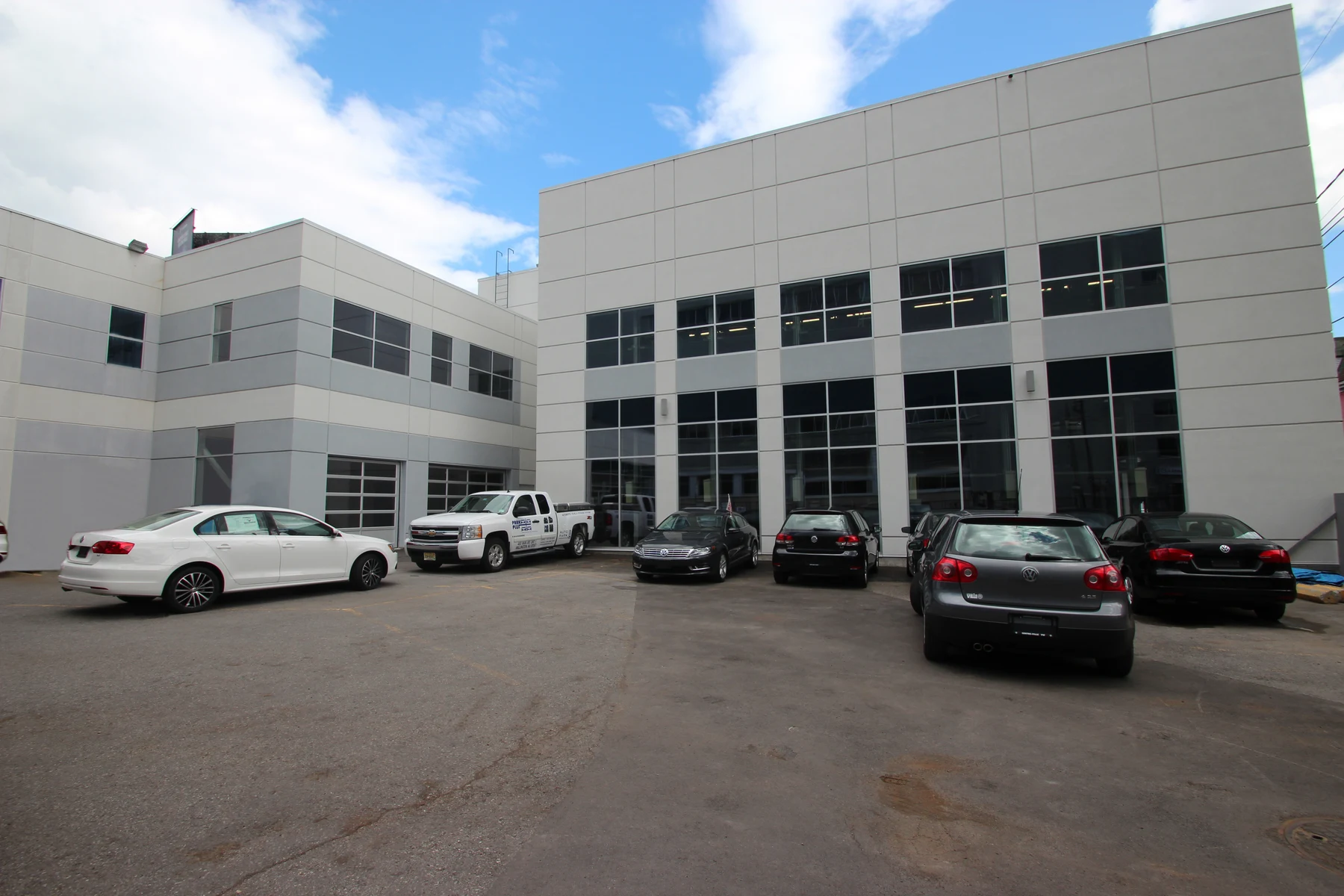 QP1000 Quad Stacker installed at Volkswagen Montreal — indoor inventory storage system