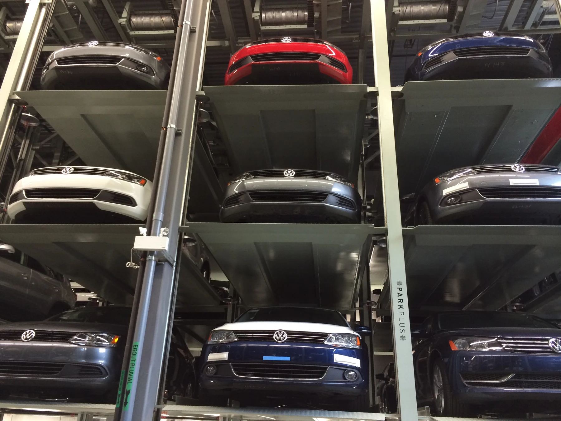 QP1000 Quad Stacker installed at Volkswagen Montreal — indoor dealership storage