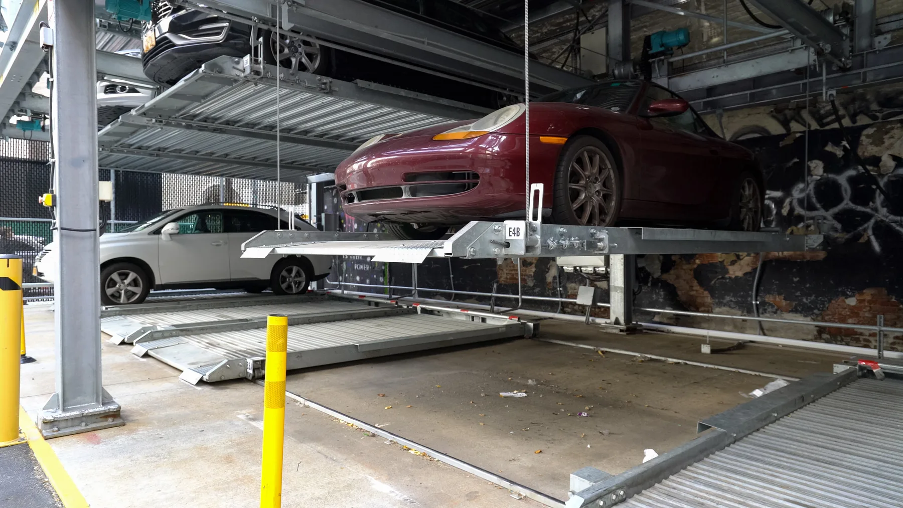 4-High Lift-Slide Puzzle Parking System at 11 W 28th St, Manhattan — valet operation