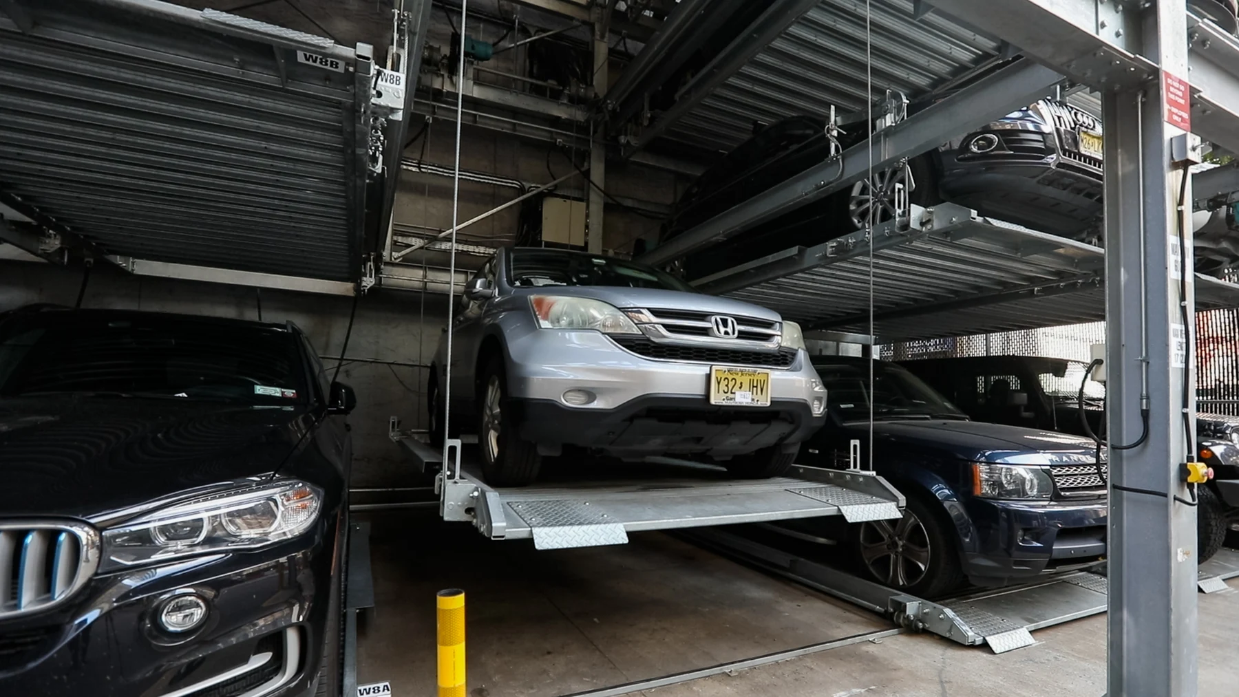 4-High Lift-Slide Puzzle Parking System at 11 W 28th St, Manhattan — street view