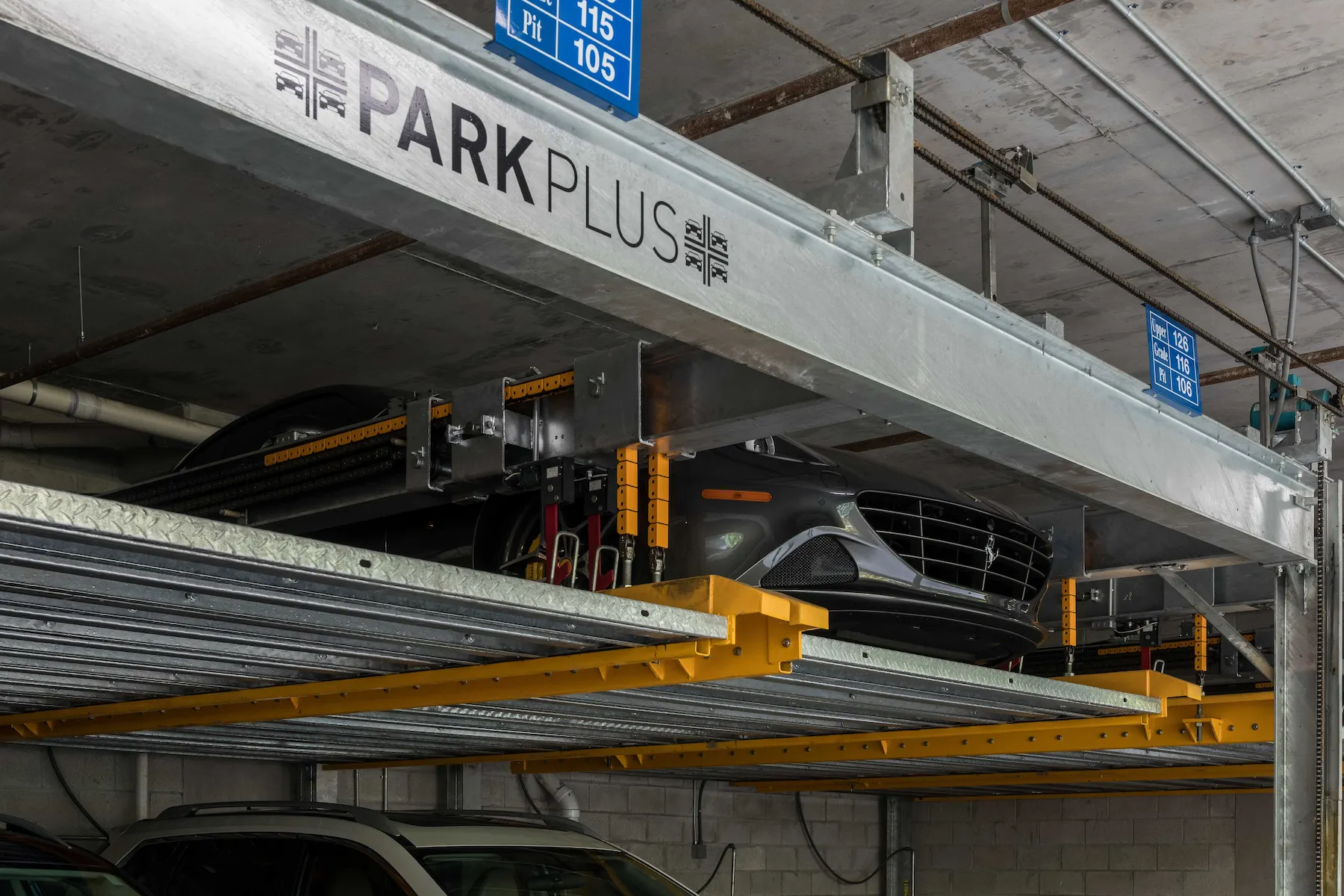 Lift-Slide Puzzle Parking System at 6080 Collins Beach House, Miami Beach — lift mechanism