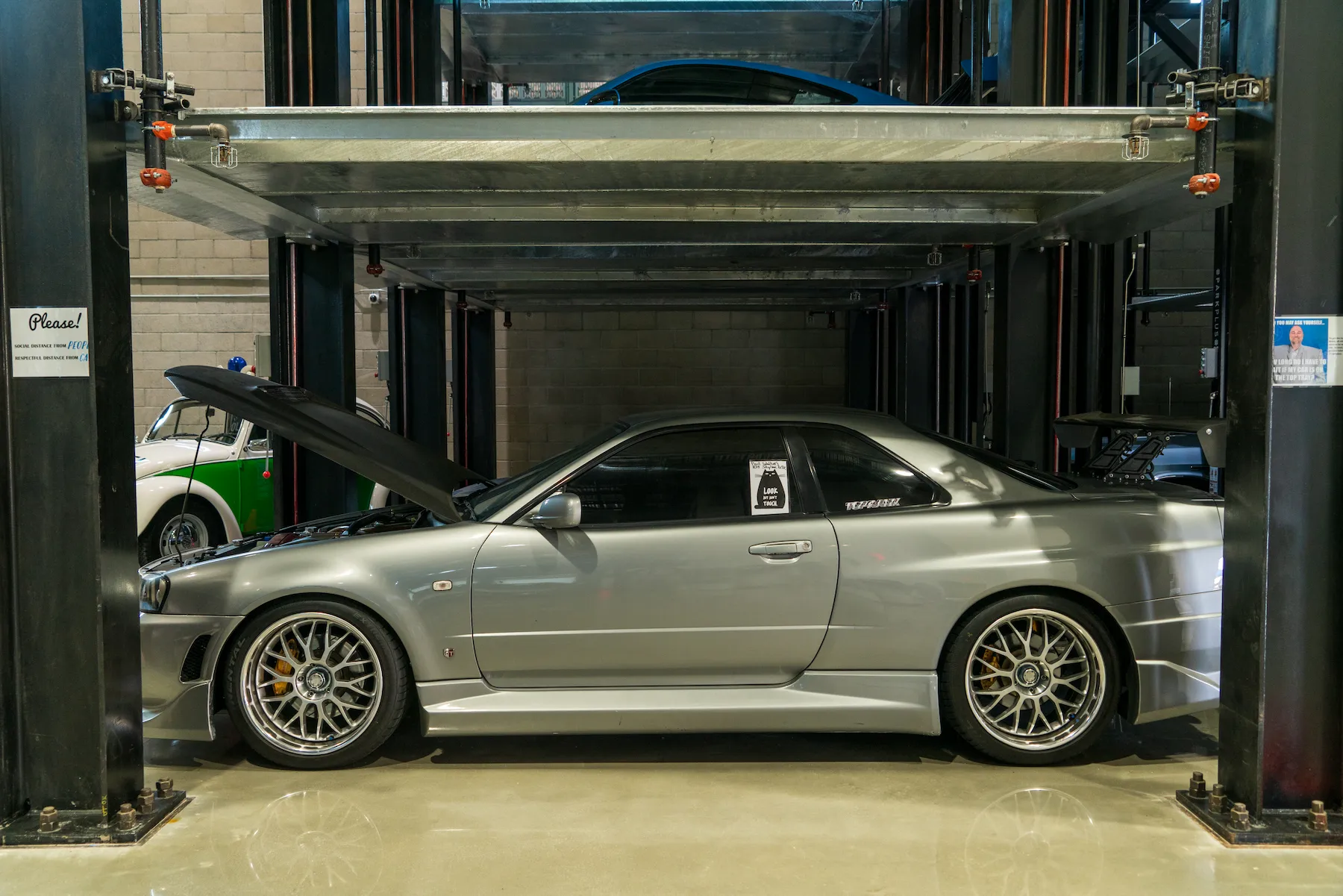 Inside the cathedral room at Westside Car Collectors Storage featuring ParkPlus QP1000 Quad Stackers